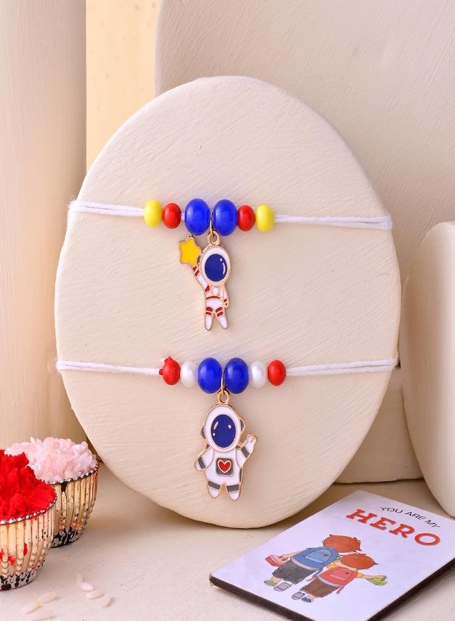 أسينشين مجموعة أسينشن المكونة من قطعتين من ألعاب رواد الفضاء الكرتونية الناعمة، راخي للأطفال، هدية مثالية للأخ أو الأخت، راكشا سوترا للبنات والأولاد مع مغناطيس ثلاجة "أنت بطلي" ورول تيلك - Image 1